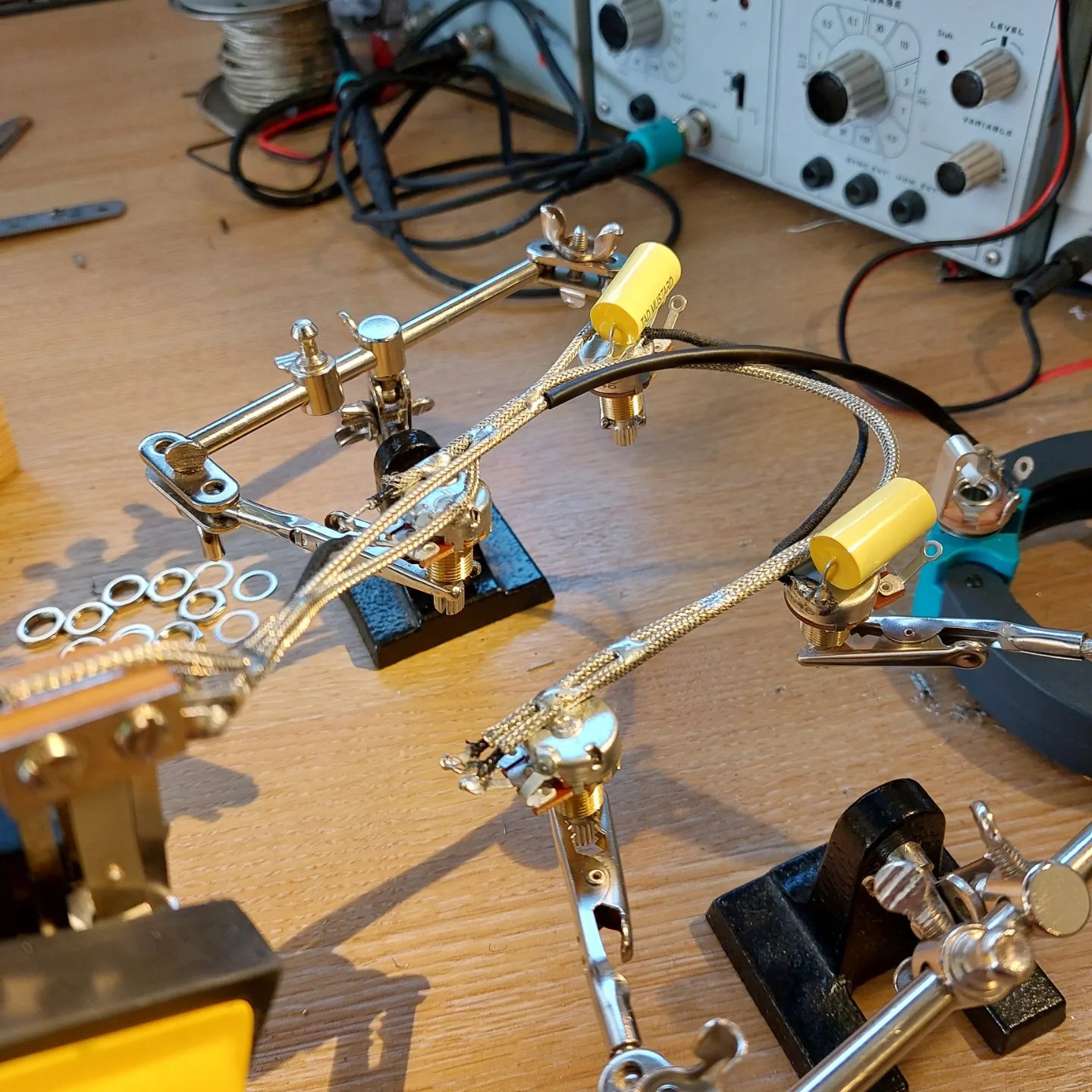 Picture of guitar components being wired together